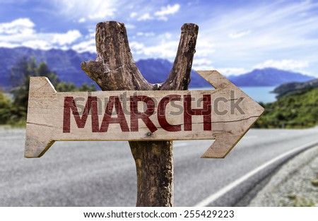 March sign with road background