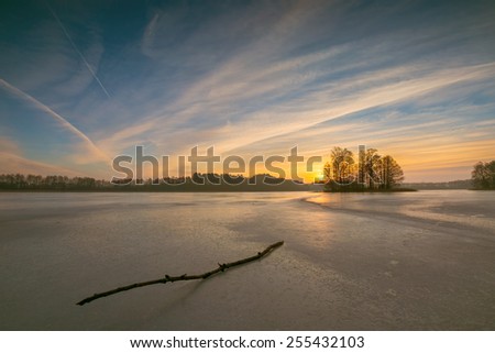 frozen lake at sunrise landscape