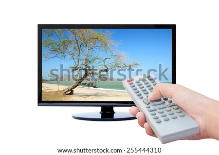 Television remote control watching tv , Sea and beach background