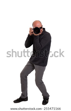 Photographer holding a professional camera
