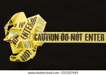Caution Do Not Enter Tape with isolated background on black