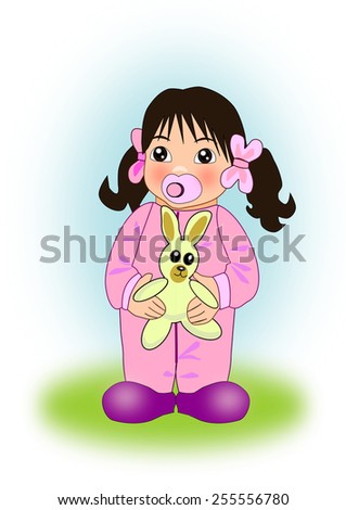 A little girl holding a toy rabbit.
