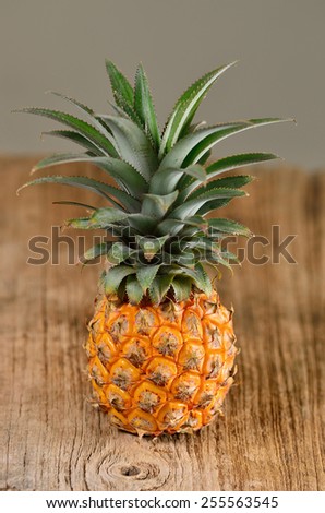  pineapple on wooden  background