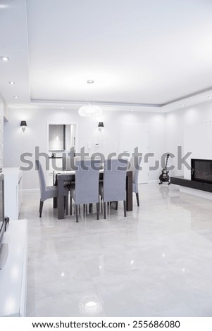 Picture of exclusive gleaming dining room interior
