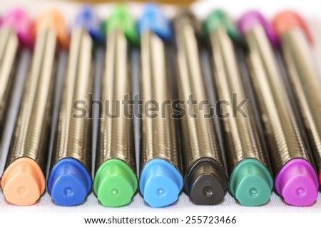 Colored pens isolated on white background close up. 