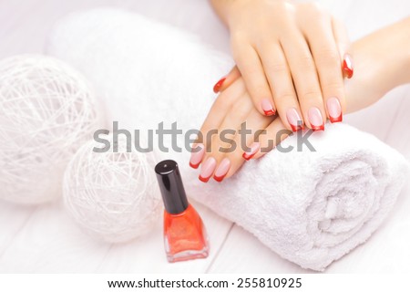 french manicure with red poppy flower