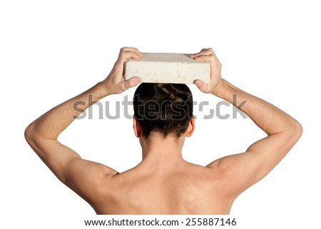 Closeup portrait of angry, frustrated man, pulling his hair out, isolated on white background with copy space