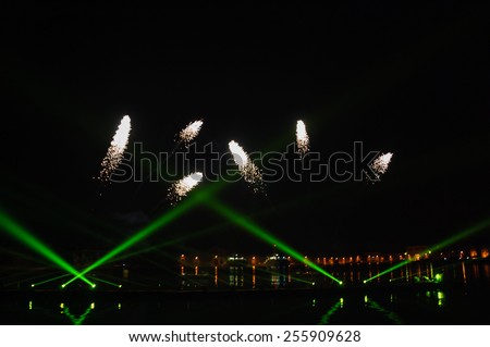 Fireworks over on the Arsenal lagoon during the Carnival celebration in Venice (Italy). Blurred lights.