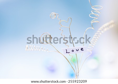 Expanding love. love expressed with gold wires. Intentionally shot with shallow depth of field.