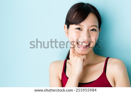 attractive asian woman skin care image on blue background