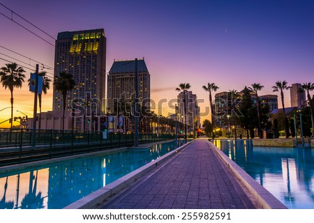 Skyscrapers and the Children's Pond at sunset, in San Diego, California.