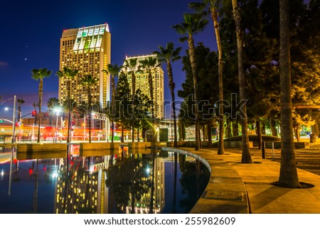 Skyscrapers reflecting in the Children's Pond at night, in San Diego, California.