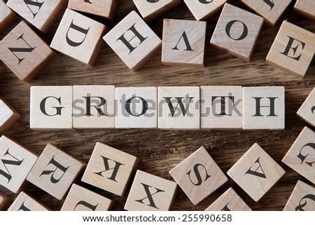 text of GROWTH on cubes
