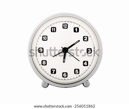 Retro alarm clock on the white background