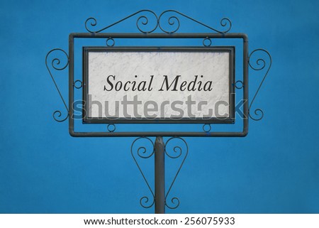 "Social Media" on a Signboard. Blue Background.