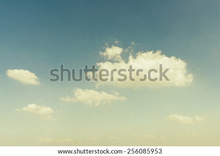 Vintage background of blue cloudy sky