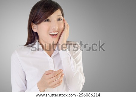 Business woman of Asian with surprised expression.