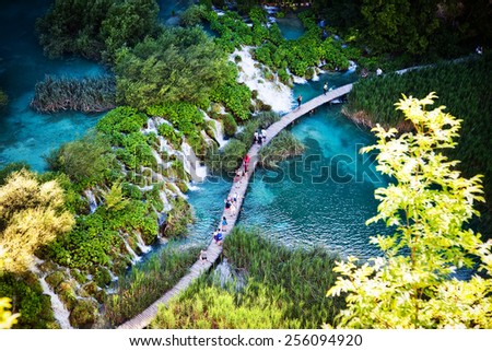Summer view of beautiful waterfalls in Plitvice Lakes National Park, Croatia Royalty-Free Stock Photo #256094920
