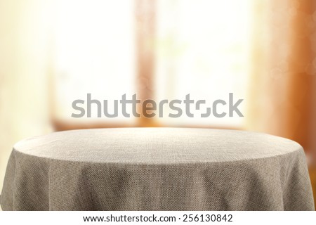 table and window of sun light  Royalty-Free Stock Photo #256130842
