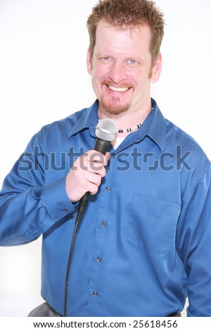 Handsome man with microphone smiling