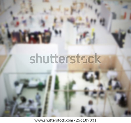 People background. Intentionally blurred editing post production. Humans, location and products not recognizable.