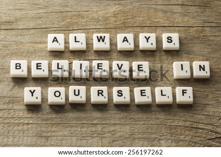 phrase always believe in yourself, over wooden background