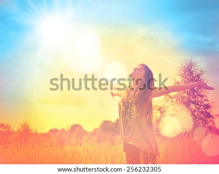 Free Happy Woman Enjoying Nature. Beauty Girl Outdoor. Freedom concept. Beauty Girl over Sky and Sun. Sunbeams. Enjoyment. Summer Meadow. Royalty-Free Stock Photo #256232305