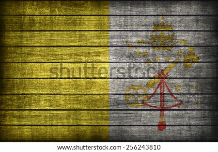 Vatican City flag pattern on wooden board texture ,retro vintage style