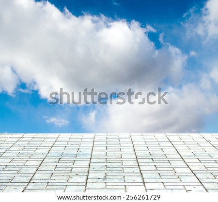 paving stone on a background of blue sky
