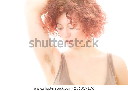 Pretty Woman with Hairy Armpit on White Background