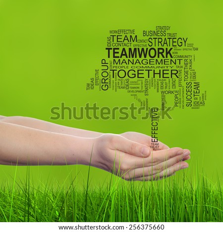 Concept conceptual text word cloud on man hand, tagcloud on green blur background and grass, metaphor to business, team, teamwork, win, management, effective, success, communication, company or group