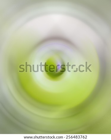 The lotus bud in basin abstract radial blur