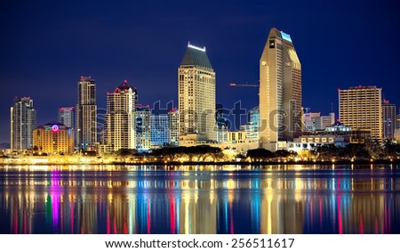 Downtown Nighttime Cityscape Skyline with Reflections in Water, City of San Diego, California USA 