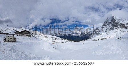 Panorama view of snow covered Kleine-Scheidegg, the interchange station for the Jungfraujoch train in Switzerland.
