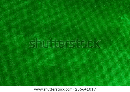 Canvas textured green background.