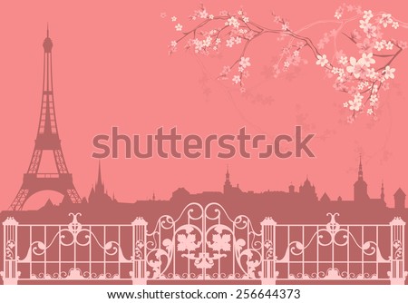 spring Paris background - eiffel tower and roofs silhouette among flowers