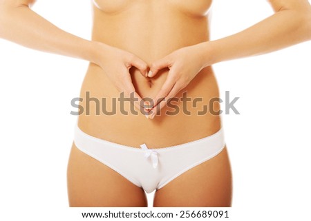 Woman carying much about her stomach
