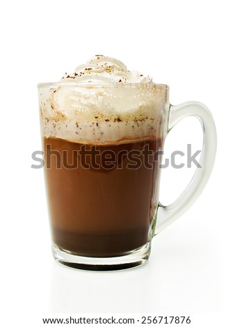 Hot chocolate with whipped cream in a glass bowl isolated on white