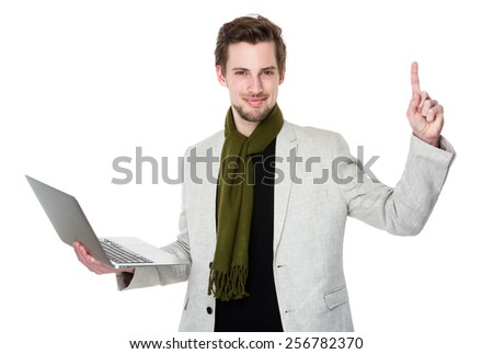 Caucasian man hold with laptop and finger point up