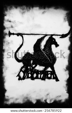 Black and white drawing of flying horse