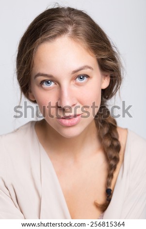 Portrait of Beautiful Young Woman Smiling