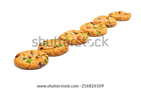 cookies with colored chocolate drops on a white background