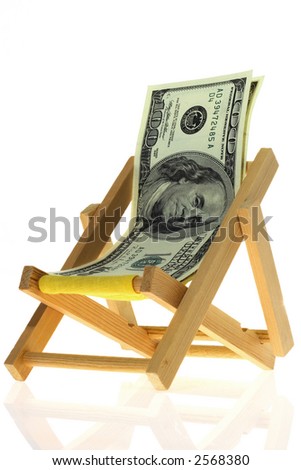 Hundred dollar bank-note on a deck  chair.