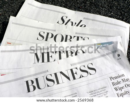 photo displaying newspaper sections