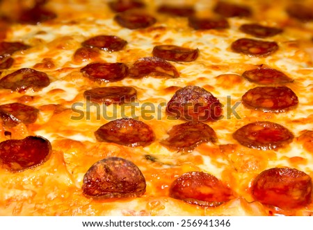Picture of a closeup pizza with cheese and pepperoni