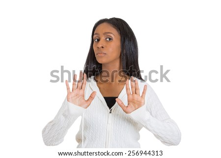 Closeup portrait of furious mad angry annoyed displeased woman raising hands up to say no, stop right there, isolated on white background. Negative human emotion facial expression sign symbol Royalty-Free Stock Photo #256944313
