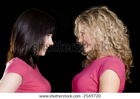 Two Pretty woman friends in pink