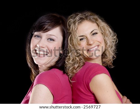 Two Pretty woman friends in pink