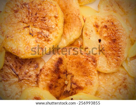 slices of baked potatoes, close-up. instagram image retro style