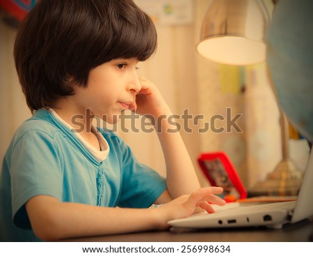 boy with computer, distance learning. instagram image retro style